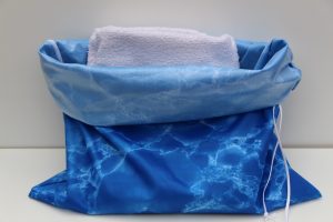 Sac de plage en polyuréthane laminé avec serviette à l'intérieur